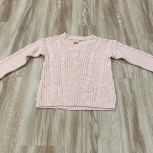 Pink angel 7/8 pink pearl sweater. See pictures - one pearl is missing